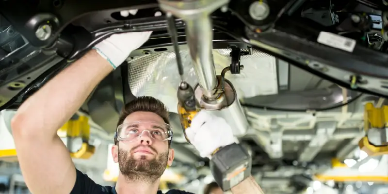 Image of mechanics working on a truck engine